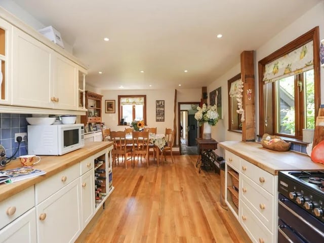 This five bed converted barn in Anmore Road, Denmead is on the market for £1.4m. It is listed on Zoopla by White & Guard Estate Agents.