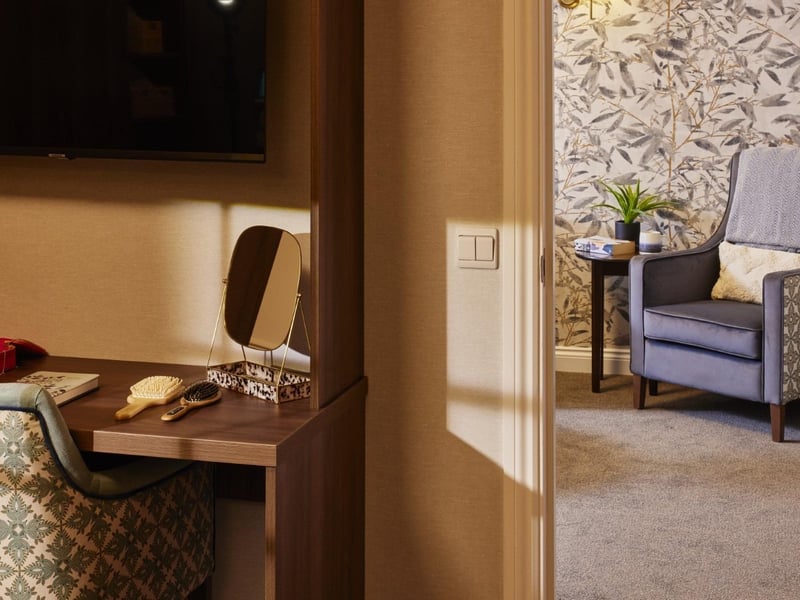 A suite comes with an ensuite & walk-in wardrobe, living area with kichenette, dining area and a TV, plus a garden view.