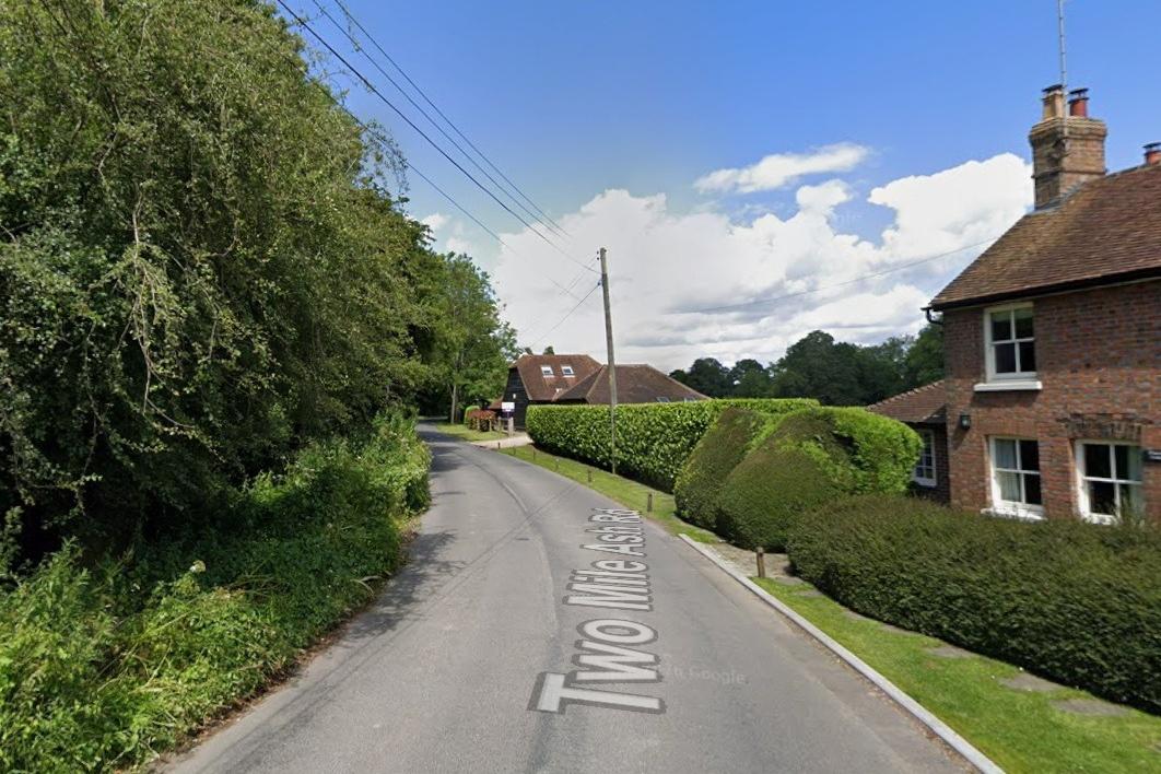 Report of blocked road due to fallen tree near Horsham