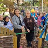 Rachel Martini, senior head of nursery, left, and Becca Bakter, head of nursery, cut the ribbon to officially open Reflections Nursery's new Forest School. Picture: Hollie Robards/Iconic Media Group