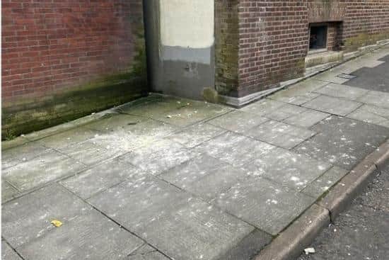 Fallen masonry on the pavement by the old post office building. Picture: Julian Hughes