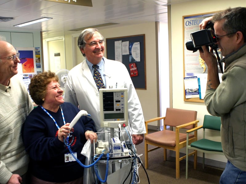 Hospital Calendar - Don Eaden Patient Maria Hains, Dr Richard Bailey Having pic taken for the Calender by Peter Crowhurst