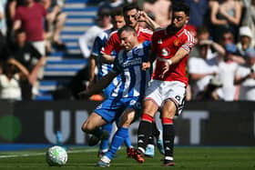 Pictured in the heat of the battle against Manchester United, James Milner, 40, is out of contract this summer and his Brighton future is yet to be decided. Photo: GLYN KIRK / AFP via Getty Images