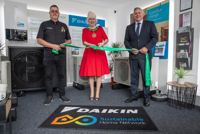 Representatives of Gas Plus and Daikin UK are joined by Bexhill-on-Sea Mayor on opening day