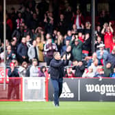 Crawley Town boss Scott Lindsey applauds the fans after the opening day victory against Bradford City. Picture: Eva Gilbert