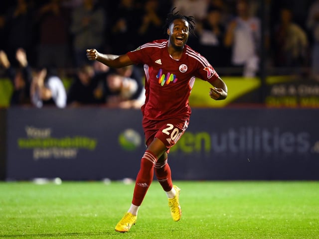 CRAWLEY, ENGLAND - AUGUST 23: James Balagizi of Crawley Town celebrates after scoring their team's second goal during the Carabao Cup Second Round match between Crawley Town and Fulham at Broadfield Stadium on August 23, 2022 in Crawley, England. (Photo by Mike Hewitt/Getty Images)