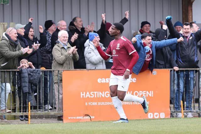He's back! Joe Gbode celebrates with the Hastings fans after his opener v Wingate & Finchley | Picture: Scott White