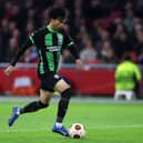 Kaoru Mitoma of Brighton & Hove Albion in action during the UEFA Europa League 2023/24 match between AFC Ajax and Brighton & Hove Albion at Johan Cruijff Arena on November 09, 2023 in Amsterdam, Netherlands. (Photo by Dean Mouhtaropoulos/Getty Images)