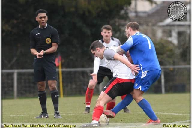 Action from Broadbridge Heath's win at Horsham YMCA | Picture: Chris Gregory