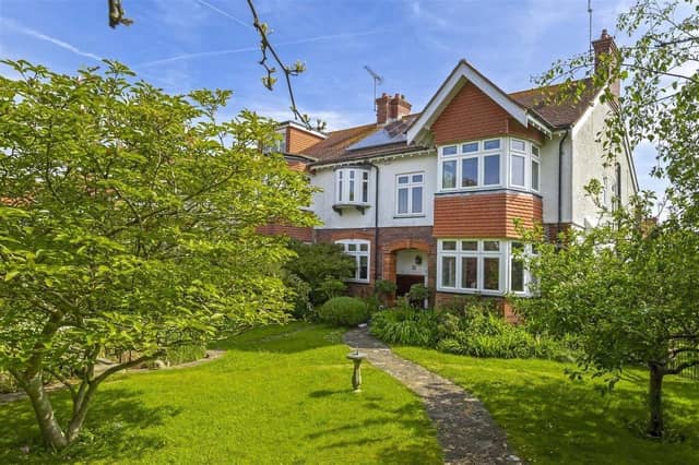 This end-of-terrace, five-bedroom property is on a corner plot in Grand Avenue, just a short walk from the town centre and yards from the beach. It has come on the market with Robert Luff & Co priced at £850,000.