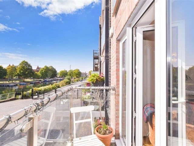 The balcony offers gorgeous views of the canal