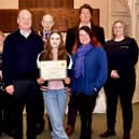Award winner Jemima Guiel and her parents, David and Sara Guiel, with judges, back row, from left, town clerk Carolyn Baynes, mayor Tony Hunt, Arundel Castle Cricket Club chief executive James Rufey and Arundel Lido manager. Picture: Charlie Waring