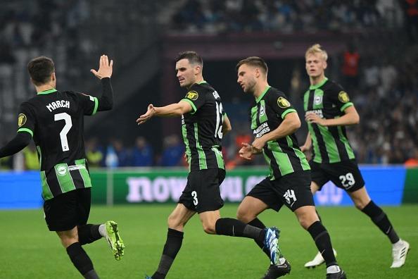 Brighton's German midfielder #13 Pascal Gross (2nd L) celebrates after scoring his team's first goal