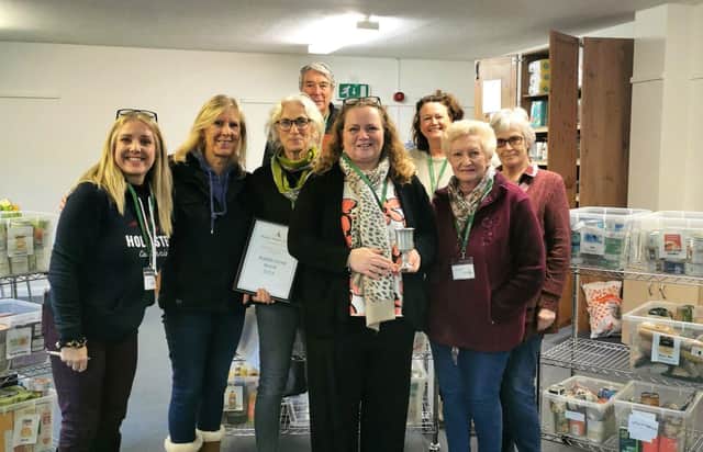 Bexhill Foodbank project manager, Michelle Pannell, Jenni Barnes, volunteers manager and volunteers at the Battle Foodbank.