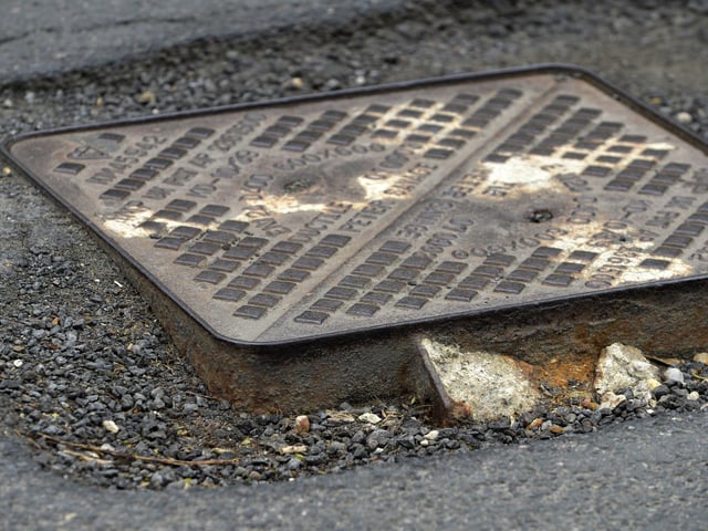 Potholes in Jevington Road, Polegate (Photo by Jon Rigby)