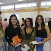 Millais students celebrate GCSE results. Left to right: Gemma Martin, Mischa Lodge, Nikita McMahon and Olivia Sharpe