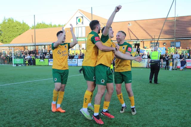 Horsham FC celebrate after knocking Dorking Wanderers out of the FA Cup. Picture by John Lines