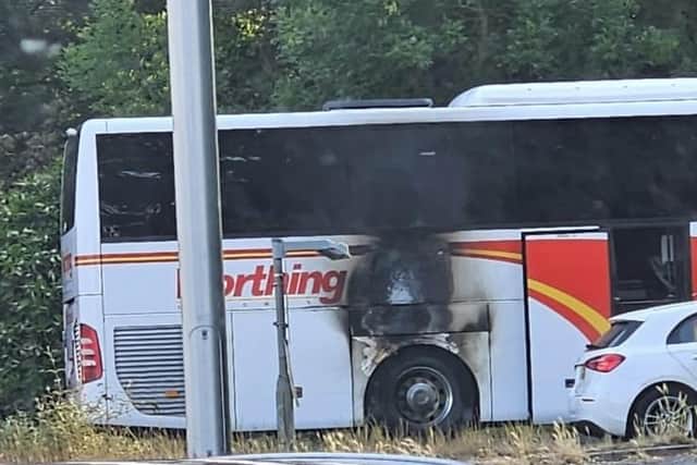 Photos from the A27 / A24 Offington roundabout in the early hours of Wednesday morning (June 7) showed a fire damaged coach. Photo: Eddie Mitchell