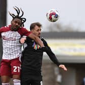 Josh Eppiah of Northampton Town contests the ball with Jack Powell of Crawley Town during the Sky Bet League Two between Northampton Town and Crawley Town at Sixfields on March 04, 2023 in Northampton, England. (Photo by Pete Norton/Getty Images)