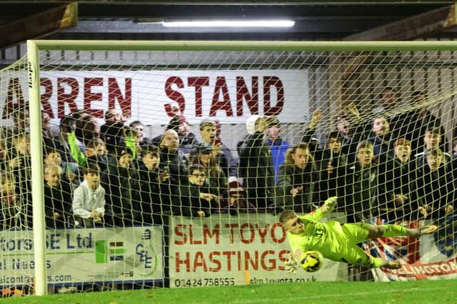 Hastings keeper Louis Rogers saves in the shootout