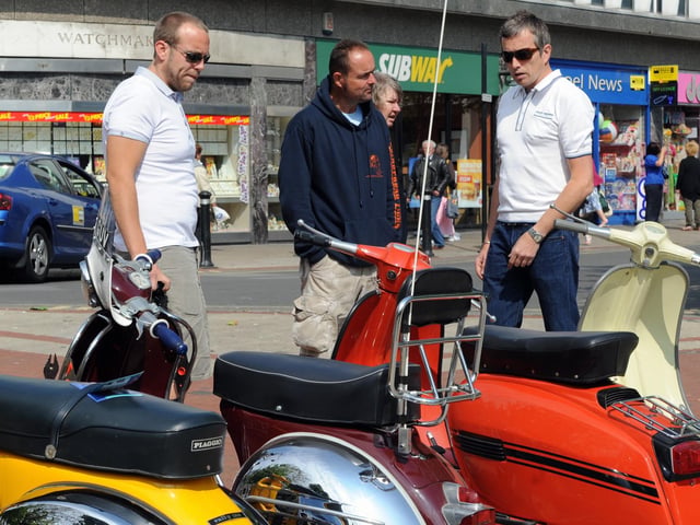 Taking a look at the scooter display in South Street Square, Worthing
