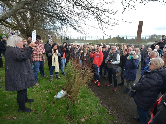 Public gathering by the gates of the Northeye site in Bexhill on Saturday April 1.