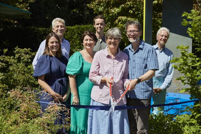 Helena Clarke from Worthing, front centre, with husband David, officially opening the Rare Space Garden at Exbury Gardens. Photo by Britt Willoughby Dyer / Submitted