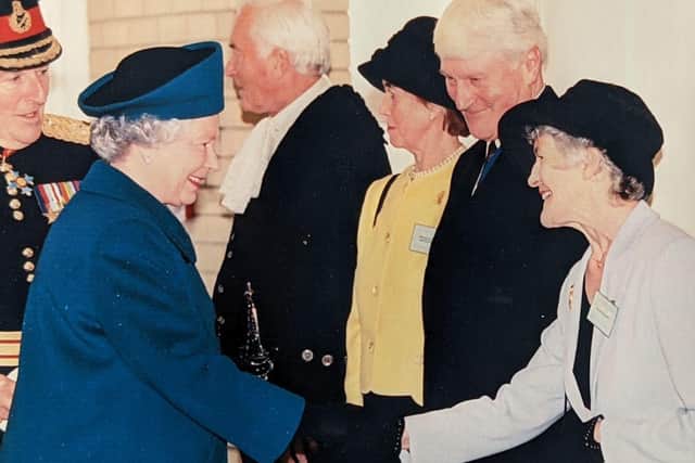 Ian Elliott and his wife Betty meeting the Queen