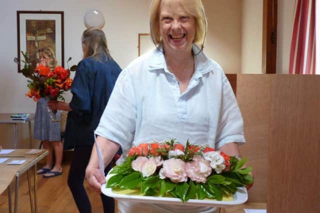 Pat Evans with winning Novice Floral Art