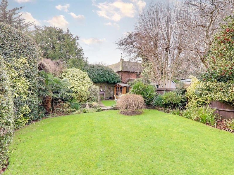 This three-bedroom detached house with feature garden has come on the market with Bacon and Company with a guide price of £725,000