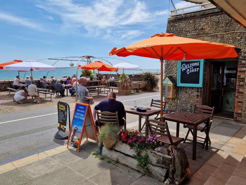 Coast Café is right on the beach, with tables inside and out