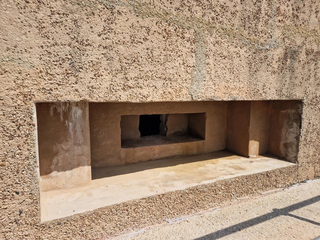 Pete Coe, one of the project leaders, and fellow former Royal Engineer Graham Cosham worked together to open the southern embrasure at the Ferring pillbox