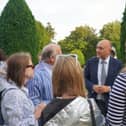 Andrew Griffith MP meeting Ukraine guests at a garden reception event in Wilton Park (August 2023)