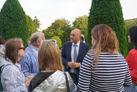 Andrew Griffith MP meeting Ukraine guests at a garden reception event in Wilton Park (August 2023)