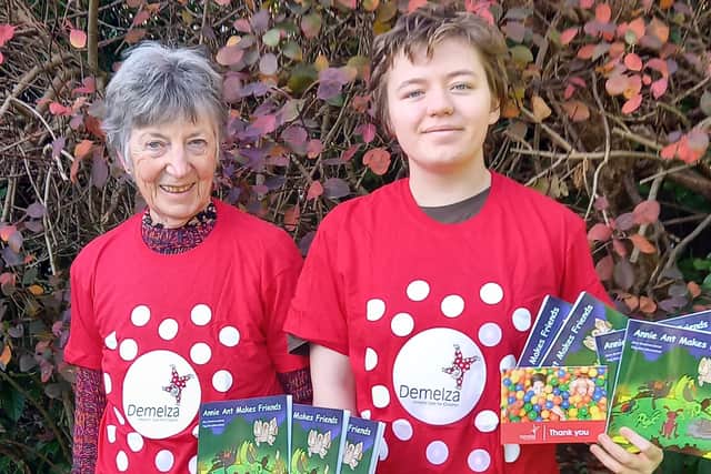 Chris Sanderson (left) is the author of the book which is illustrated by her neighbour's granddaughter and aspiring artist Twig Otos (right).