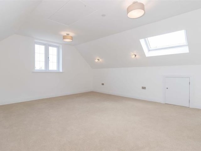 Offers in excess of £925,000 are invited for this new luxury property in Mill Lane, High Salvington. It has beautiful views over the South Downs, versatile and spacious accommodation.