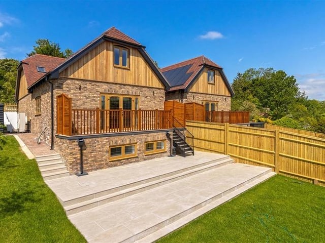 Offers in excess of £900,000 are invited for this new luxury property in Mill Lane, High Salvington. It has beautiful views over the South Downs, versatile and spacious accommodation.
