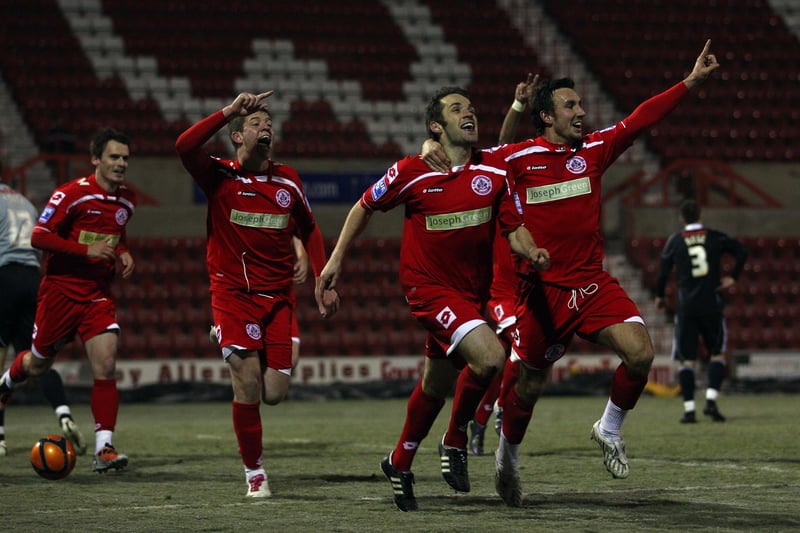 Crawley Town's Ben Smith (c) celebrates with team mates after scoring the winning goal during the  FA Cup 2nd Round Replay between Swindon Town and Crawley Town at County ground on December 7, 2010.