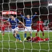 Steven Alzate of Brighton and Hove Albion celebrates after scoring the winner at Liverpool in February 2021