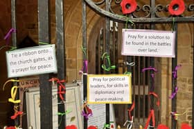 Tie a ribbon to the church gates and join in prayers for peace.
