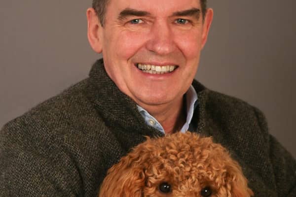 Author David Melville with family dog
