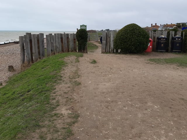 You should have just walked through the gap in this wooden fence and you need to continue along the shoreline