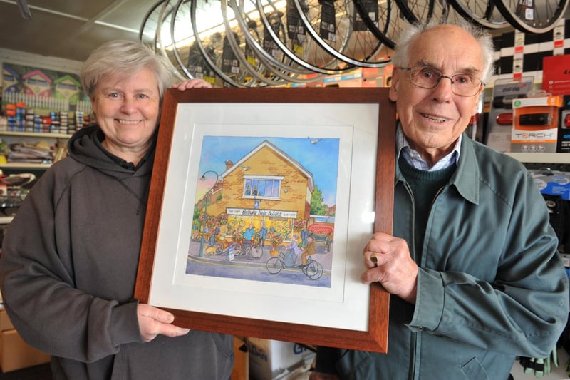 Anthony Hole and Sons began trading in 1897, and past and present owners Peter Jeffery and Julie Richards were at the shop for the presentation of artwork depicting the business over the years, by artist Lyndsey Smith