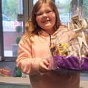 Winner of the Hazel Lodge Easter Bunny hunt 10 year old Maisie with her prize.
