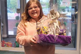 Winner of the Hazel Lodge Easter Bunny hunt 10 year old Maisie with her prize.
