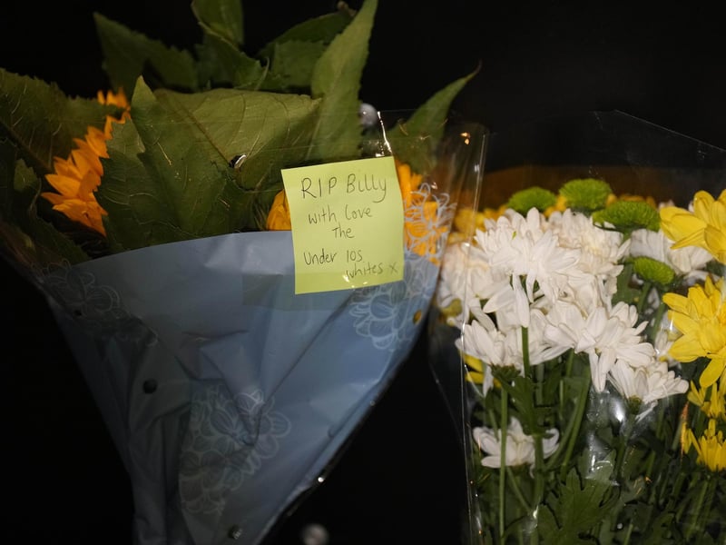 Chichester City FC and former Arsenal academy striker Billy Vigar has died after sustaining a "significant brain injury".
Vigar, 21 and born in Worthing, was injured during a game at Wingate and Finchley on Saturday in the Isthmian League Premier Division.
It is thought the injury was caused when he collided with a concrete wall, but the club has not confirmed this.
Vigar's family said on Thursday they were "devastated that this has happened while he was playing the sport he loved".
"After sustaining a significant brain injury last Saturday, Billy Vigar was put into an induced coma," the family said.
"On Tuesday, he needed an operation to aid any chances of recovery. Although this helped, the injury proved too much for him and he passed away on Thursday morning.
"The responses to the original update show how much Billy was loved and thought of within the sport." : Floral tributes to Billy Vigar are left at Chichester City FC