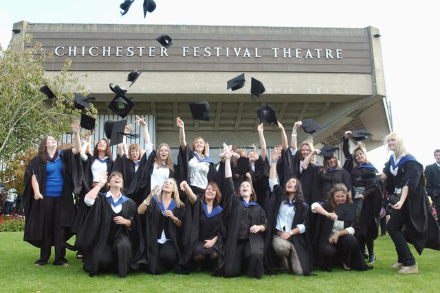 A great setting, a great feeling, a great achievement... graduates celebrate outside Chichester Festival Theatre