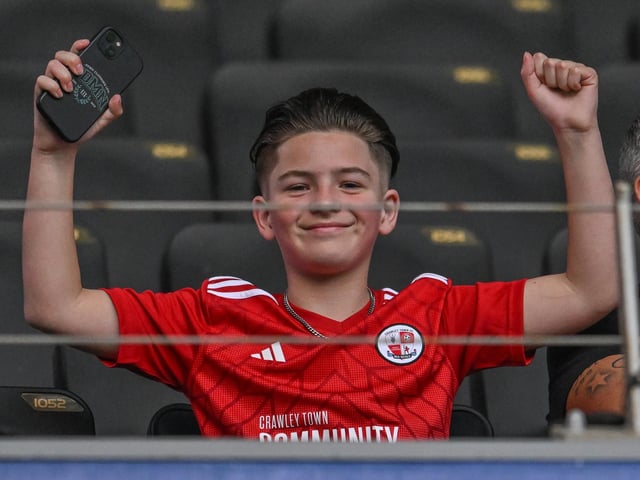 Crawley Town fans during the EFL Sky Bet League 2 play-off second leg match between Milton Keynes Dons and Crawley Town at stadium:mk, Milton Keynes, England on 11 May 2024.:Crawley Town hammered MK Dons 5-1 - and 8-1 on aggregate - to reach the League Two play-off final Wembley. Photographer Dennis Goodwin/Pro Sport Images was there to catch the action, the crowd and the celebrations