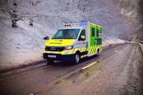 An ambulance in wintry conditions