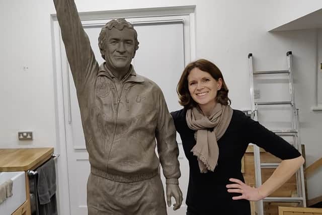 Sculptor Hannah Stewart with the clay of footballing legend Danny Bergara before it was cast in bronze